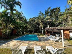 Casa 5 suítes, Piscina e Churrasqueira na Riviera em Bertioga
